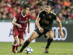 Philippe Coutinho (l.) bleibt beim FC Liverpool