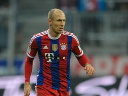 Arjen Robben in balbezit namens Bayern München in het duel met Freiburg in de Bundesliga (16-12-14)