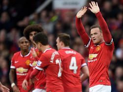Wayne Rooney (dcha.) tras marcar el 3-0 ante el Tottenham. (Foto: Getty)