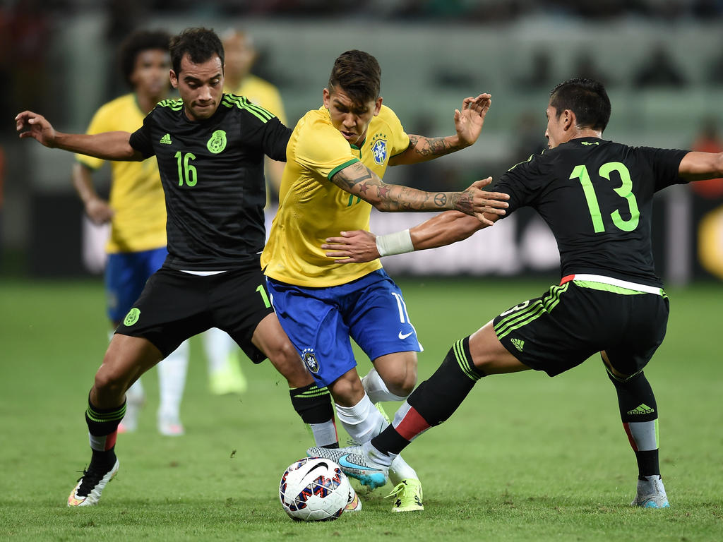 Roberto Firmino (M.) ist mittlerweile ein wichtiger Bestandteil der brasilianischen Nationalmannschaft