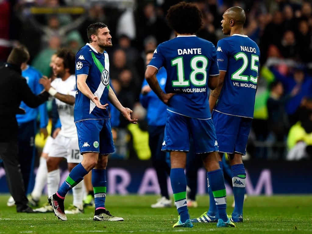 Daniel Caligiuri, Dante und Naldo (v.l.) müssen das Champions-League-Aus verdauen Daniel Caligiuri, Dante und Naldo (v.l.) müssen das Champions-League-Aus verdauen