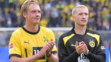 Julian Brandt (l.) und Marco Reus wollen mit dem BVB hoch hinaus