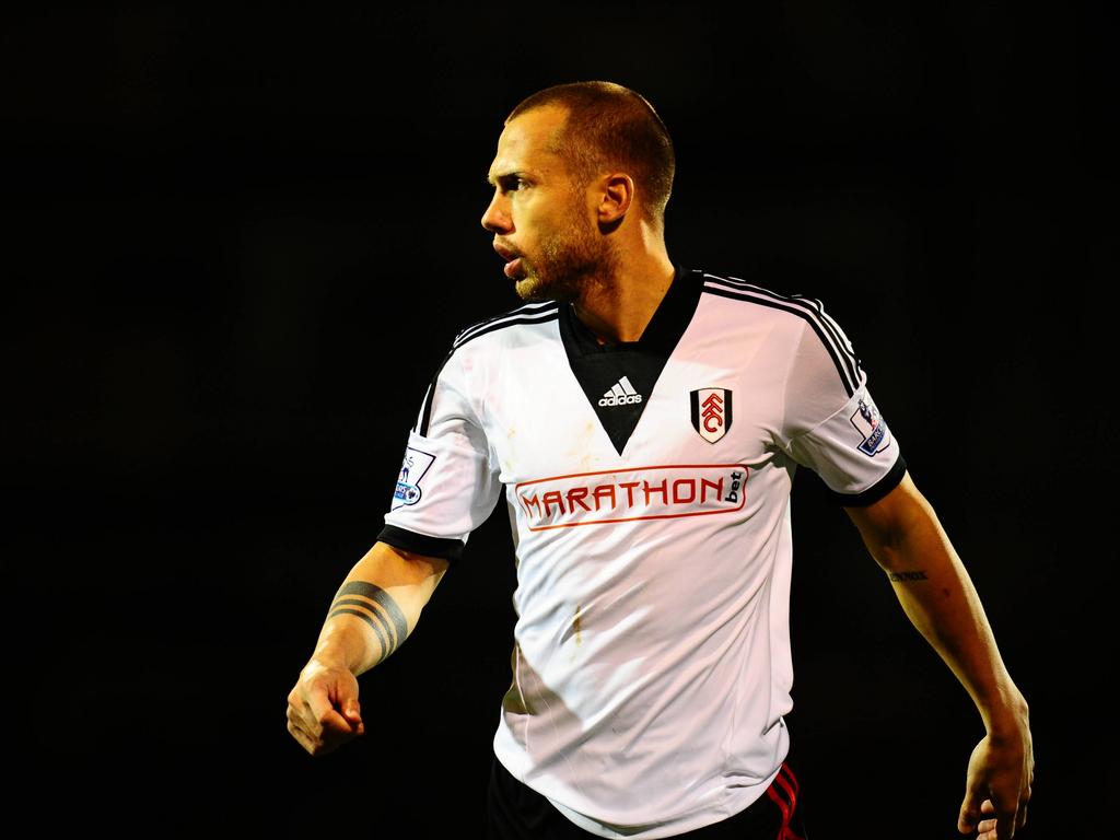 John Heitinga in actie tijdens Fulham - Liverpool. (12-2-2014) John Heitinga in actie tijdens Fulham - Liverpool. (12-2-2014)