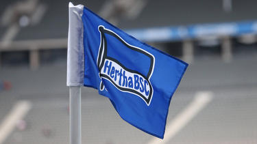 Hertha Berlin head coach Pal Dardai said he will stick with the club despite their relegation to the second division A Hertha Berlin supporter wearing the team's jersey leaves the Olympic Stadium in May after the team's relegation to the second division was confirmed Hertha Berlin players react after their relegation to the second division was confirmed in May