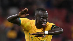 Awer Mabil (right) says underdogs Australia want to 'shock the world' in Qatar