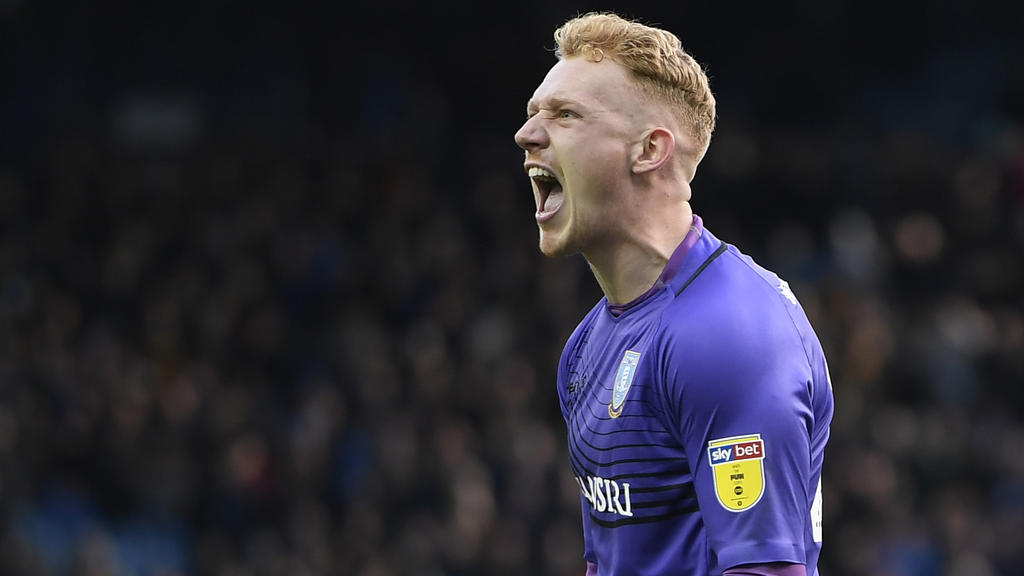 Cameron Dawson of Sheffield Wednesday celebrates victory.