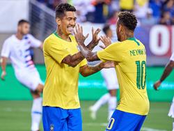 Firmino y Neymar celebran su victoria contra Estados Unidos. (Foto: Imago)