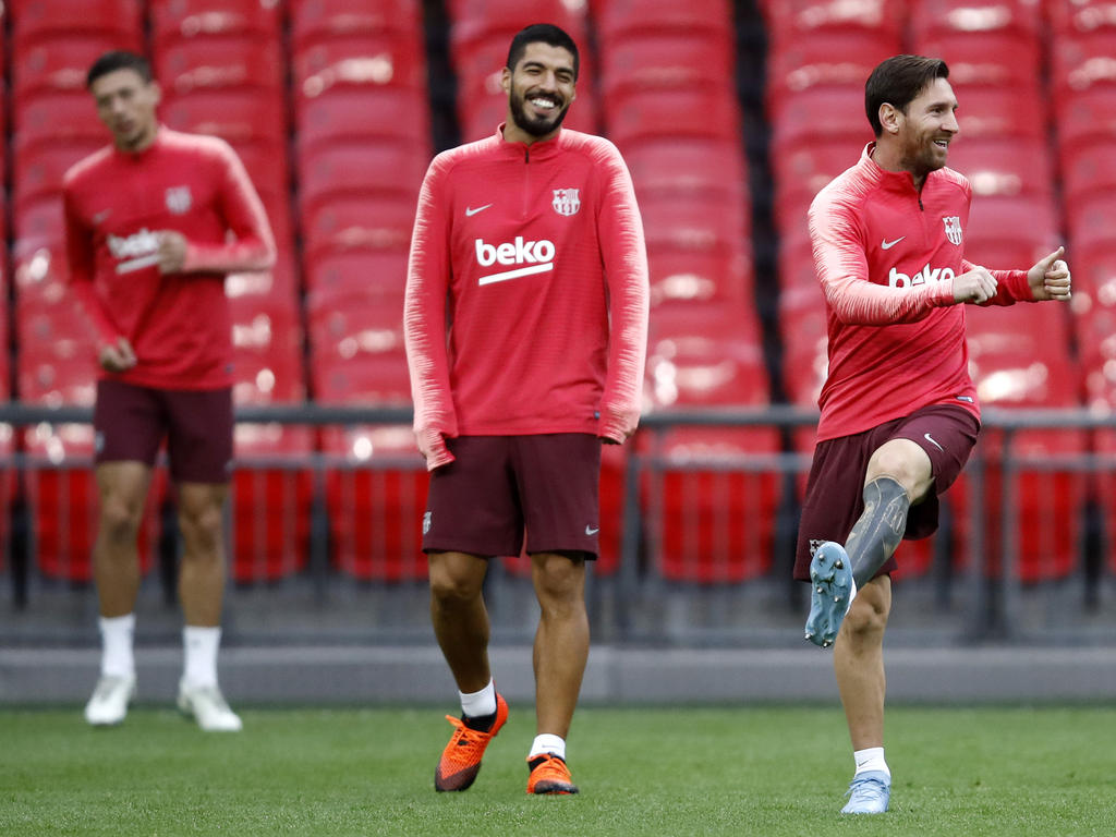 Suárez y Messi entrenan hoy antes de medirse al Tottenham. (Foto: Getty)