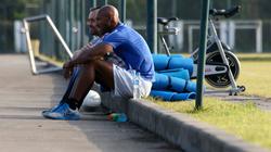 Nicolas Anelka and his teammates of Shanghai Shenhua FC look on during a training session at Shanghai Shenhua Football Training Centre in Shanghai, China, 16 October 2012.