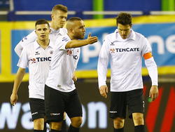 Heraclied Iliass Bel Hassani (m.) is na de 2-0 van Vitesse boos op zijn aanvoerder, Mark-Jan Fledderus (r.). (21-12-2014)