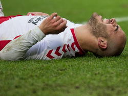 Ruud Boymans verbijt de pijn na de zoveelste tackle op zijn enkel tijdens FC Utrecht - Heracles Almelo. (07-12-2014).