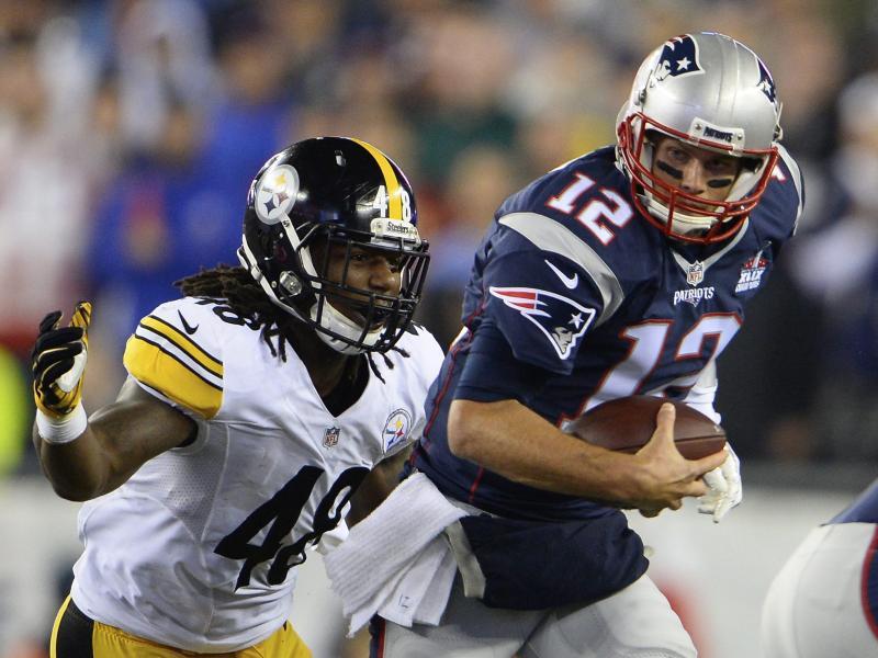 Patriots-Quaterback Tom Brady entwischt Bud Dupree. Foto: CJ Gunther Patriots-Quaterback Tom Brady entwischt Bud Dupree. Foto: CJ Gunther
