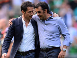 Thomas Eichin (l.) steht weiterhin zu Trainer Robin Dutt.