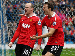 Wayne Rooney und Jonny Evans