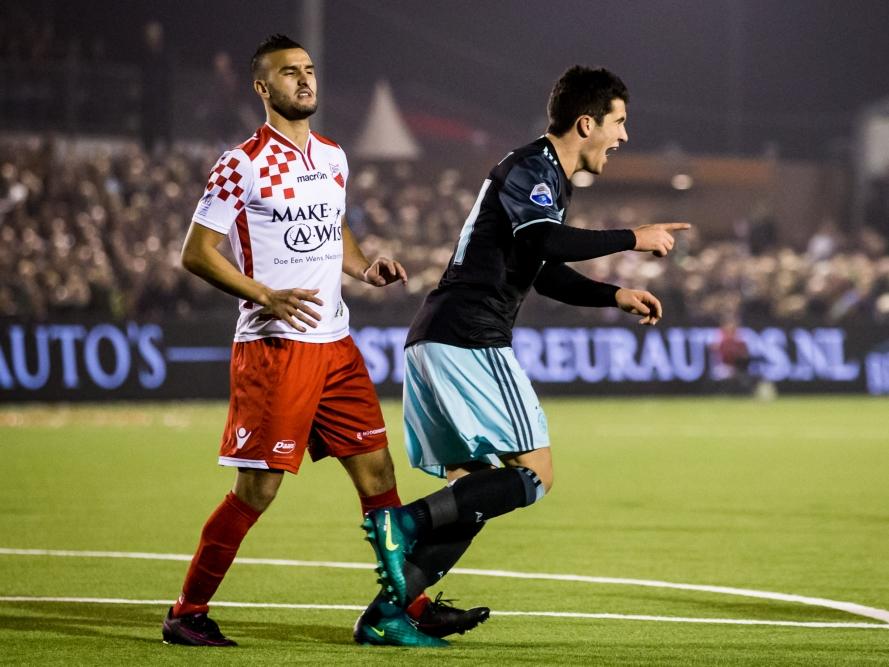 Ajacied Pelle Clement (r.) scoort tijdens zijn debuut in het bekerduel Kozakken Boys - Ajax (26-10-2016).