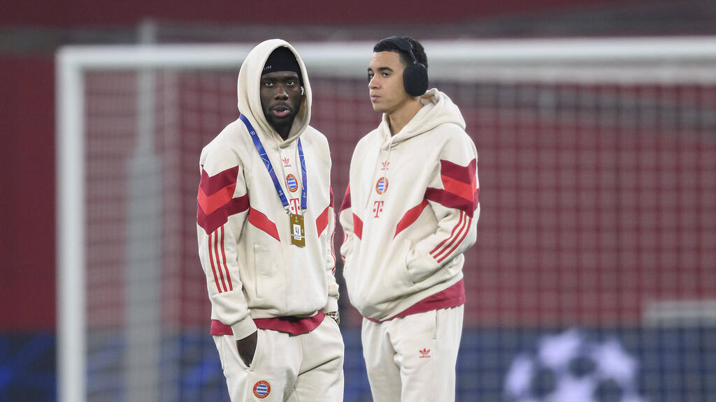 Jamal Musiala (r.) und Alphonso Davies werden dem FC Bayern noch lange fehlen Jamal Musiala (r.) und Alphonso Davies werden dem FC Bayern noch lange fehlen