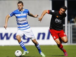 PEC Zwolle-speler Thomas Necid (l.) in duel met Excelsior-speler Sander Fischer (r.). (22-03-2015)