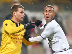 Gregor Breinburg in duel met Marc Höcher tijdens Roda JC-NEC in de Jupiler League. (12-12-14)