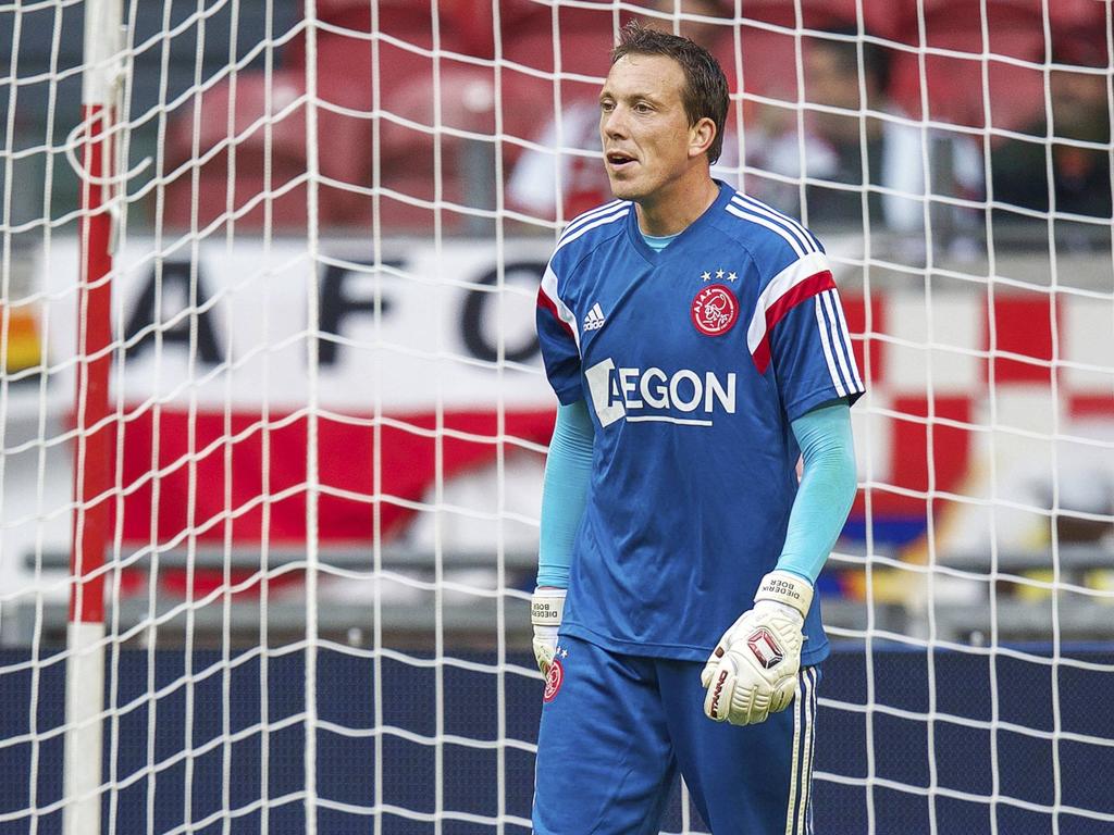 Diederik Boer tijdens zijn eerste warming-up in het shirt van Ajax. (13-09-2014)