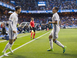 Álvaro Morata (l.) brachte Real früh auf Kurs