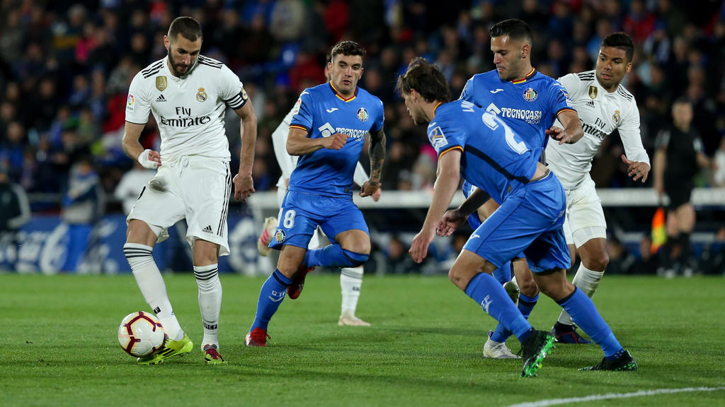Benzema en un duelo reciente contra el Getafe. (Foto: Getty)