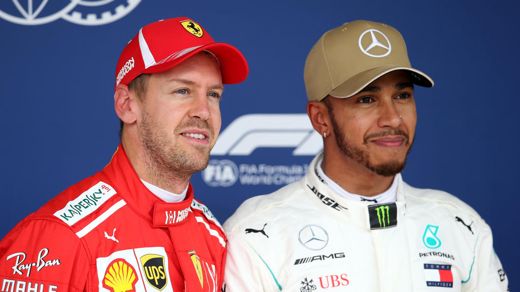 Sebastian Vettel (l.) könnte Lewis Hamilton (r.) gefährlich werden Sebastian Vettel (l.) könnte Lewis Hamilton (r.) gefährlich werden