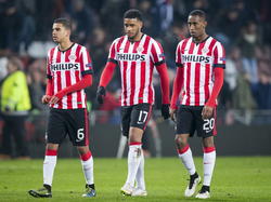 Teleurstelling bij PSV spelers Adam Maher (l.), Jurgen Locadia (m.) en Joshua Brenet (r.) door het verlies tegen Zenit St. Petersburg in de Europa League. (19-02-2015)