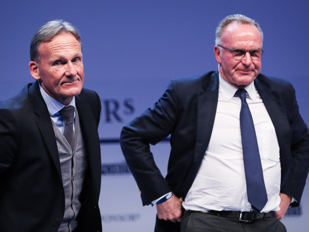 Hans-Joachim Watzke (l.) und Karl-Heinz Rummenigge kritisieren die FIFA