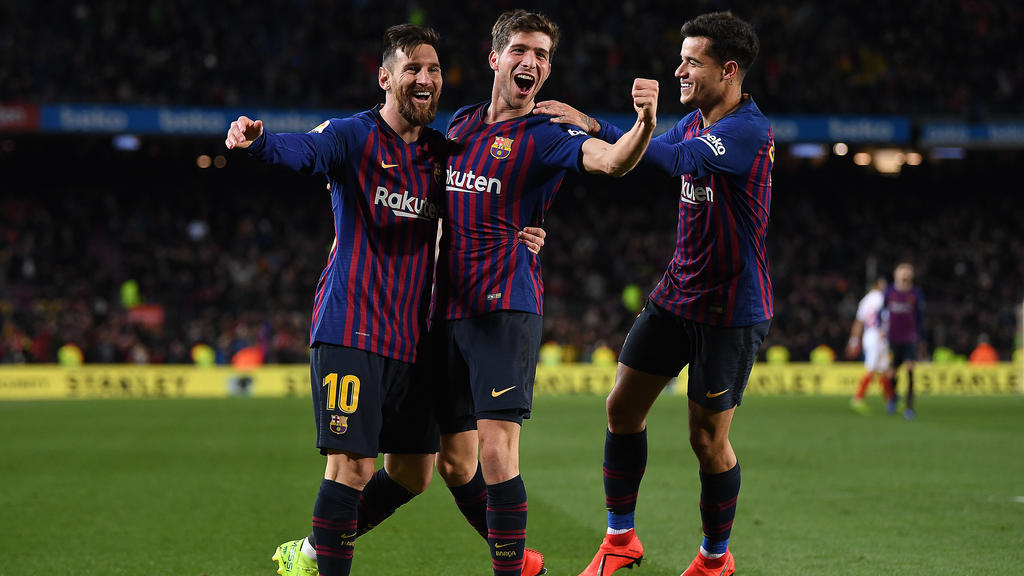 Lionel Messi (l.) steht mit dem FC Barcelona im Halbfinale der Copa del Rey