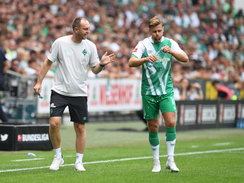 Werders Trainer Ole Werner (l) und Stürmer Niclas Füllkrug
