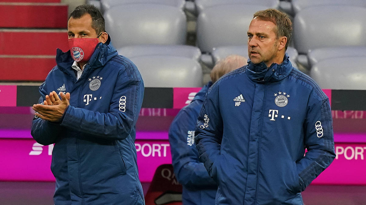 Hansi Flick (r.) will mit seinen Bayern in Dortmund gewinnen Hansi Flick (r.) will mit seinen Bayern in Dortmund gewinnen