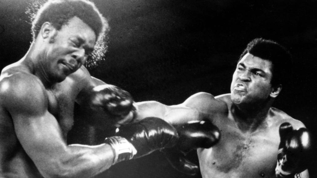 "Rumble in the Jungle": Muhammad Ali (r.) besiegt George Foreman