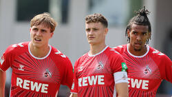 Bleiben Eric Martel (m.) und Damion Downs (r.) langfristig beim 1. FC Köln?