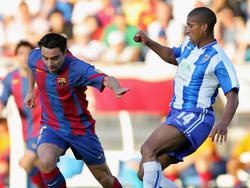 Marcelo Romero con el Málaga contra el Barcelona de Xavi. (Foto: Getty)