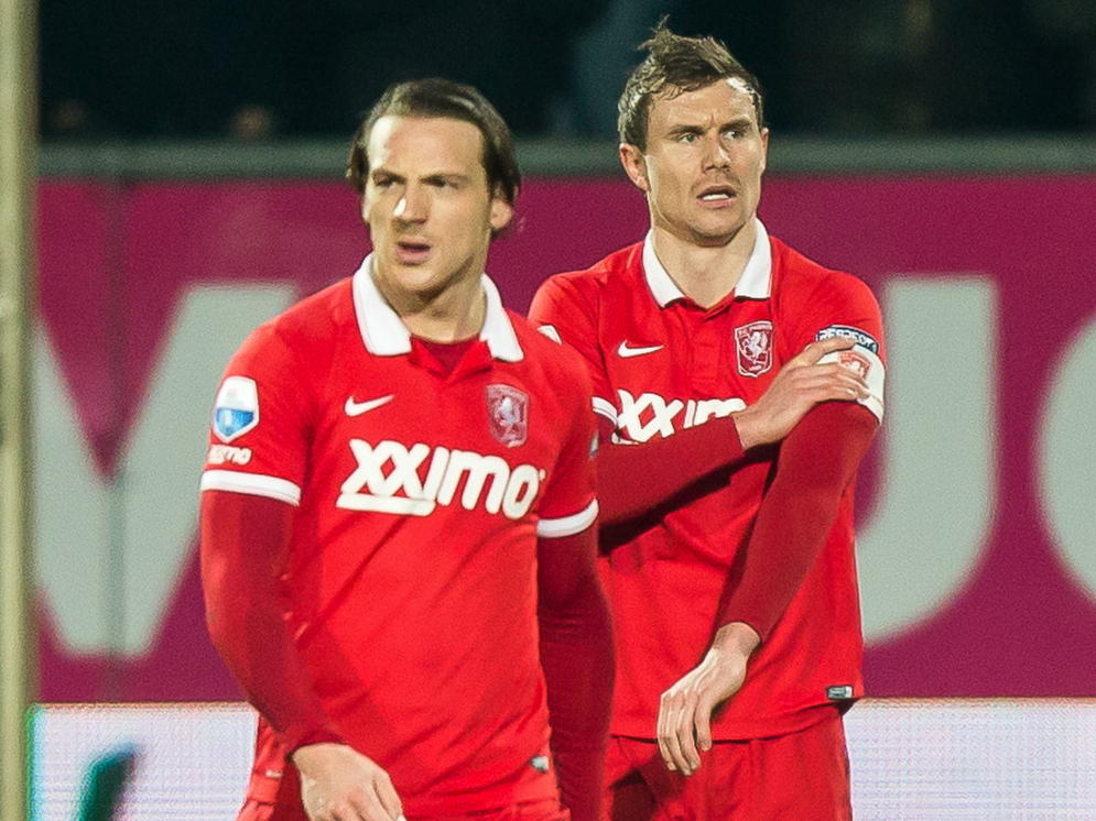 Binnen korte tijd moet FC Twente de 1-0 en 2-0 slikken op bezoek bij Willem II. De gezichten van Robbert Schilder (l.) en Andreas Bjelland (r.) spreken boekdelen. (06-03-2015)