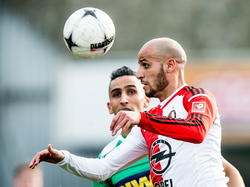 Karim El Ahmadi wint een kopduel namens Feyenoord tijdens de competitiewedstrijd tegen FC Dordrecht. (13-05-2015). 