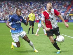 Felitciano Zschusschen (l.) in duel met Lex Immers (r.) tijdens Feyenoord - FC Twente. (11-08-2013)