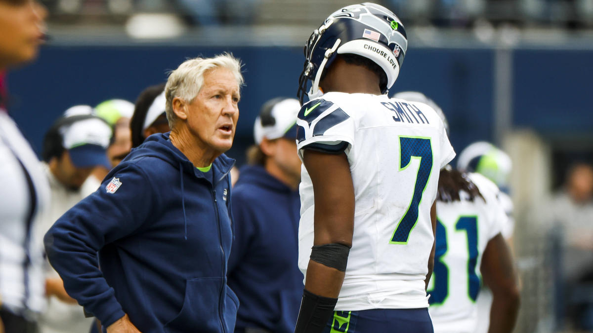 Pete Carroll (l.) verteidigte seinen Quarterback Geno Smith
