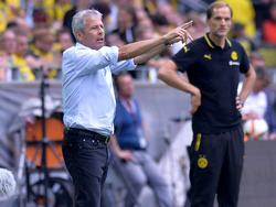Lucien Favre (l.) könnte Thomas Tuchel als BVB-Trainer beerben