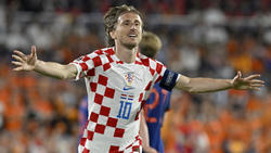 Croatia midfielder Luka Modric (C) celebrates with teammates after winning the Nations League semi against the Netherlands Spain's hero against Italy, Joselu, praised Croatia midfielder Luka Modric for his longevity and ambition