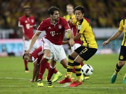 Bereits im Vorjahr duellierten sich Bayerns Javi Martínez (l.) und Shinji Kagawa im Supercup