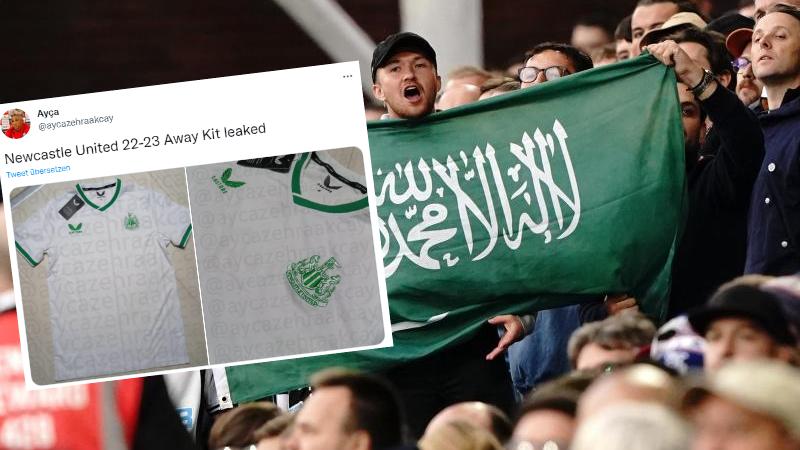 Ein Fan von Newcastle United hält die Fahne von Saudi-Arabien während eines Spiels hoch