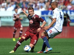 Ciro Immobile (l.) vom FC Turin zieht mit starken Leistungen das Interesse mehrerer Klubs auf sich