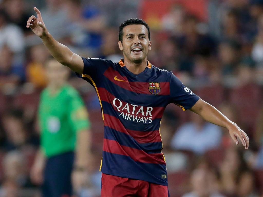 Pedro Rodríguez kan lachen tijdens het oefenduel FC Barcelona - AS Roma. (05-08-2015)