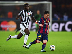Der FC Barcelona hat sich um Paul Pogba (l.) bemüht