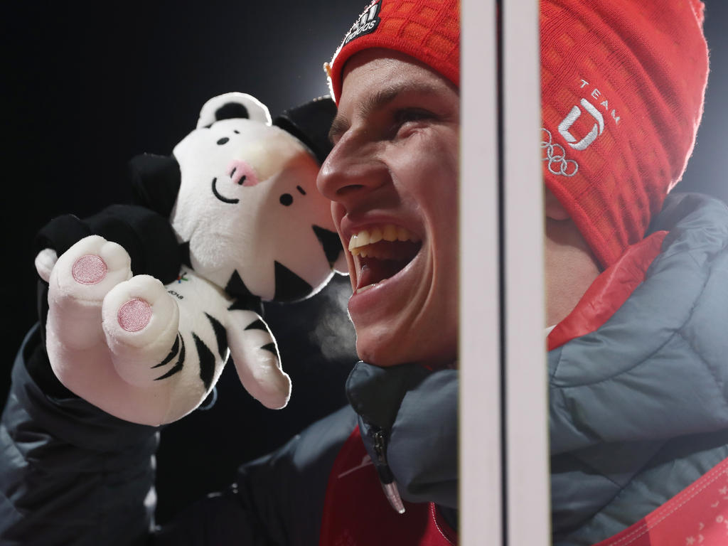 Andreas Wellinger feierte seinen Olympiasieg ausgiebig Andreas Wellinger feierte seinen Olympiasieg ausgiebig