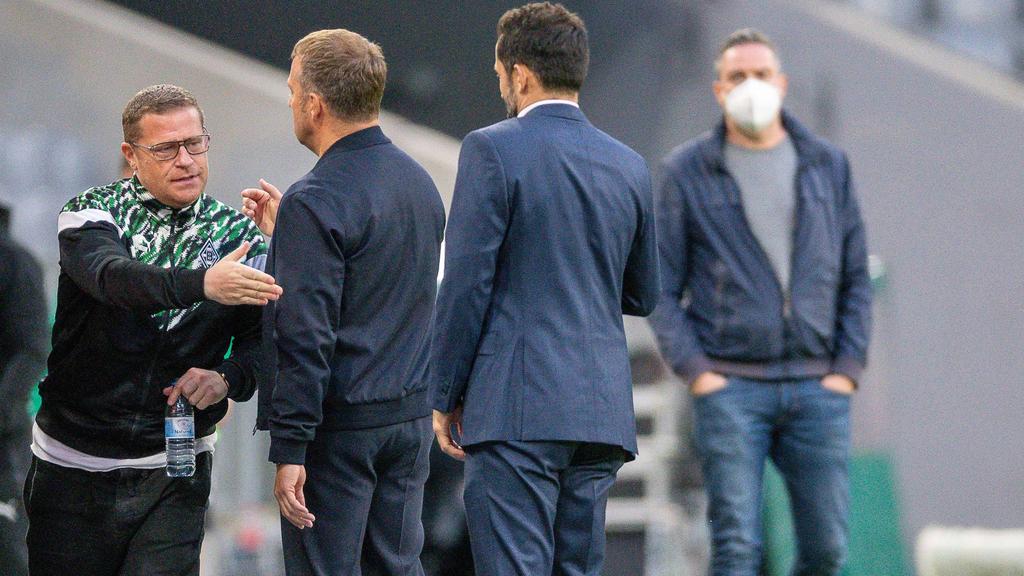 Gladbachs Max Eberl (l.) entschuldigt sich für den Vorfall gegen den FC Bayern