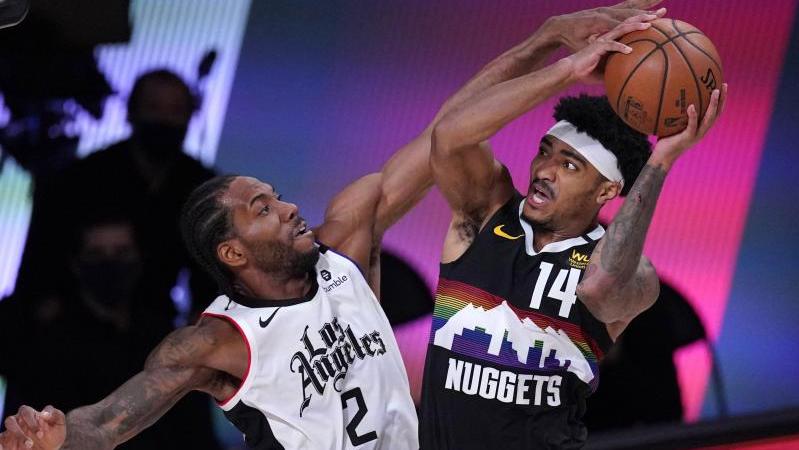 Kawhi Leonard (l.) von den Los Angeles Clippers verteidigt gegen Denvers Gary Harris Kawhi Leonard (l.) von den Los Angeles Clippers verteidigt gegen Denvers Gary Harris