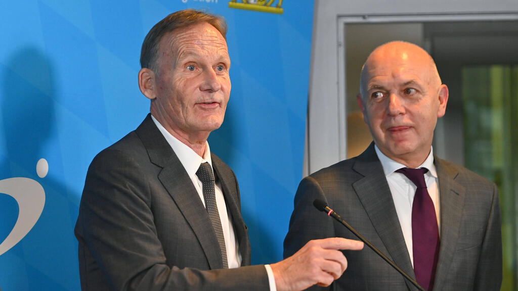 Hans-Joachim Watzke (l.) und Bernd Neuendorf (r.)