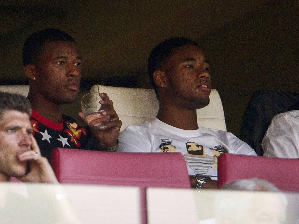 Giliano (r.) en Georginio (l.) Wijnaldum samen op de tribune. (31-07-14) Giliano (r.) en Georginio (l.) Wijnaldum samen op de tribune. (31-07-14)